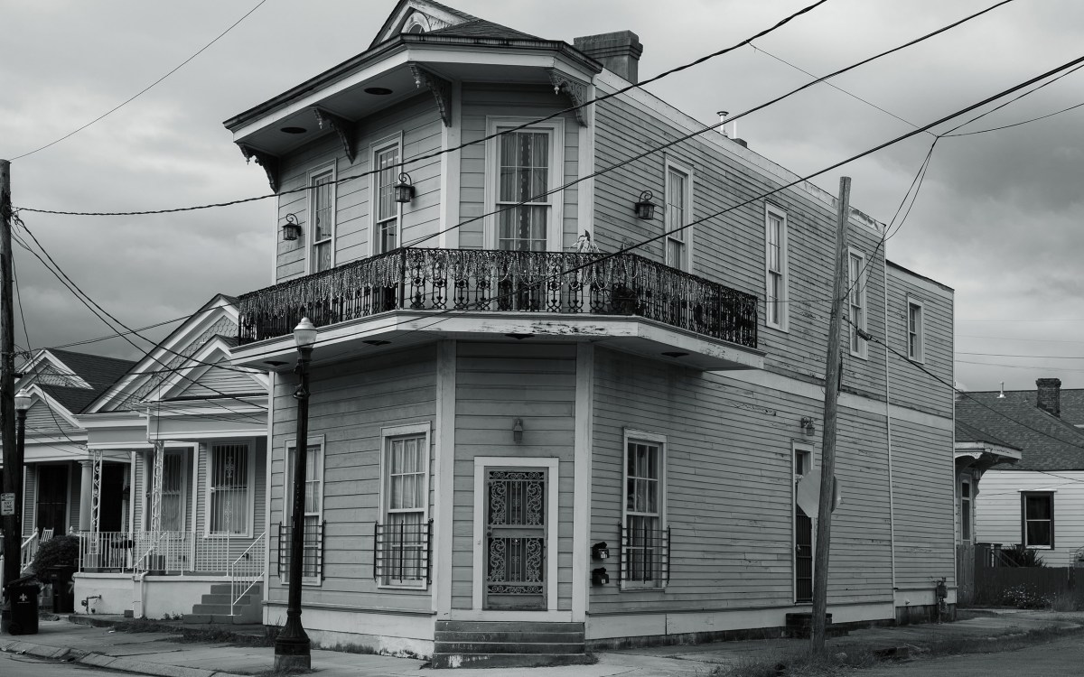 House in rundown neighborhood.