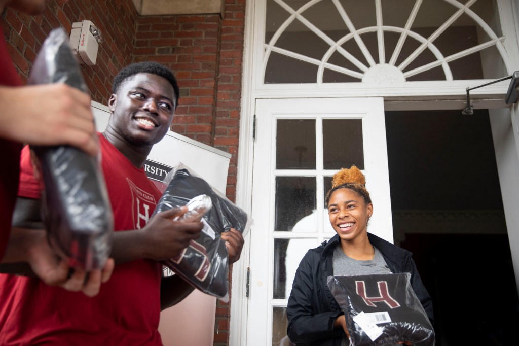 Students receiving lettersweaters.