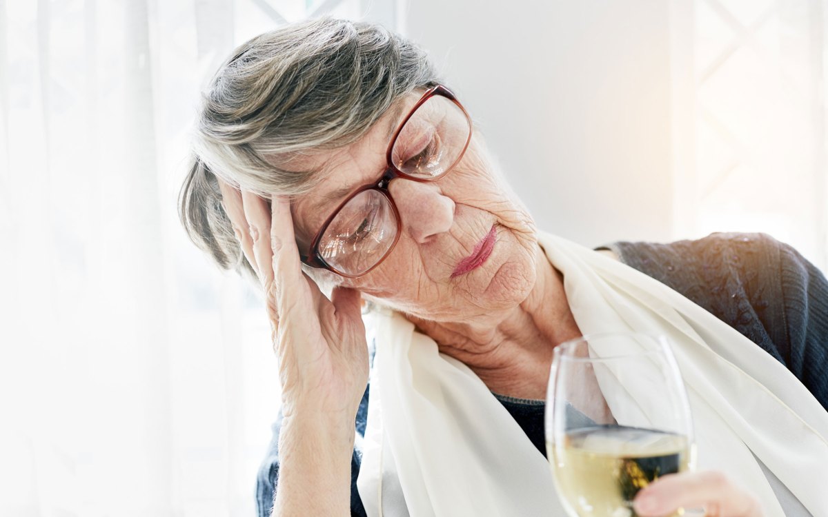 Woman drinking.