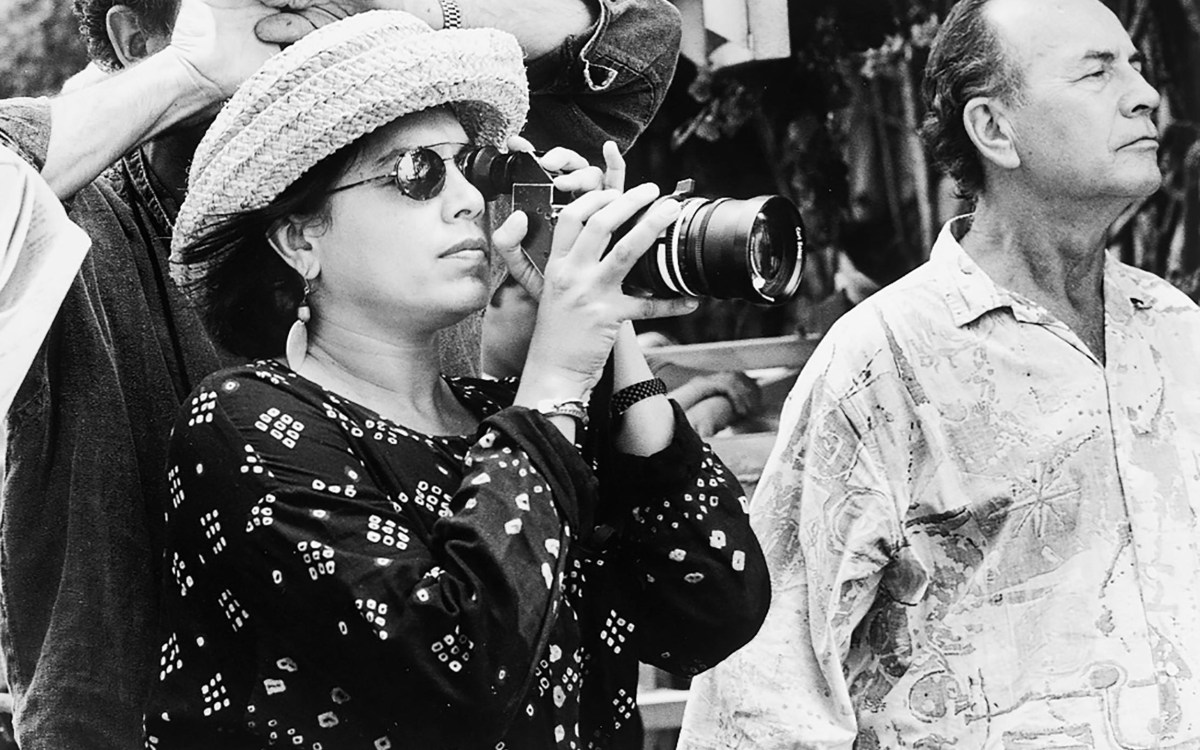 Mira Nair holds camera on set of "The Perez Family."