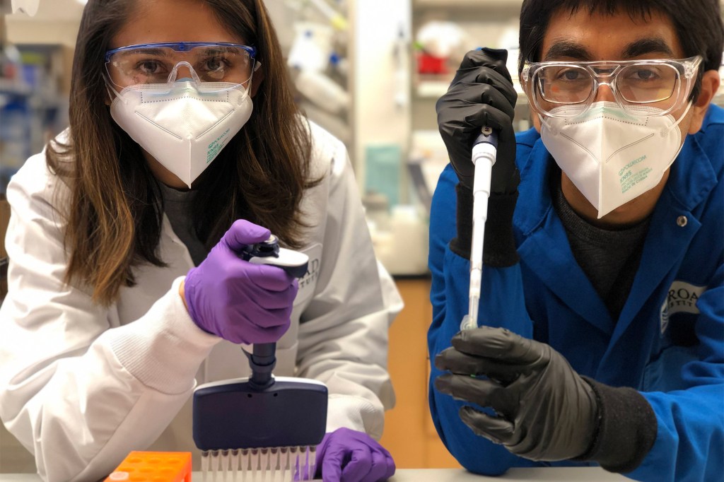 Postdoctoral fellow Samagya Banskota (left) and graduate student Aditya Raguram .