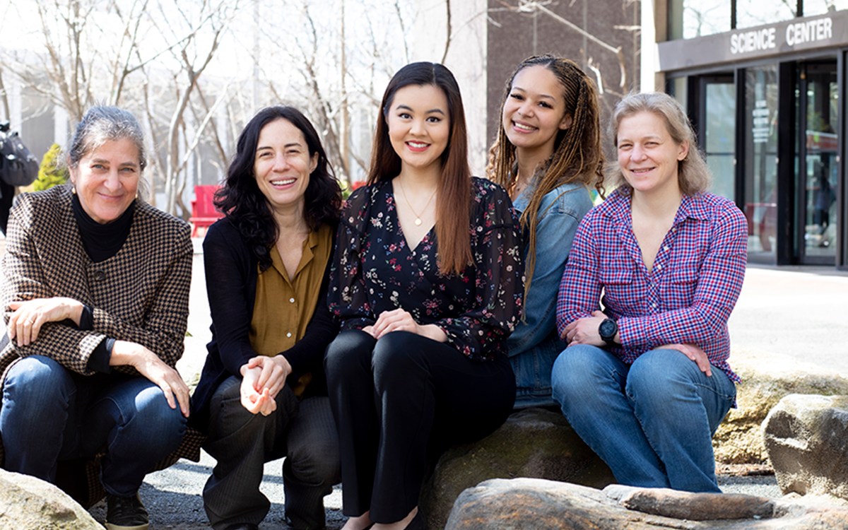 Elizabeth Guo, Samantha C.W. O’Sullivan, Melissa Franklin, Cora Dvorkin, and Jenny Hoffman pose together outside the Science Center.