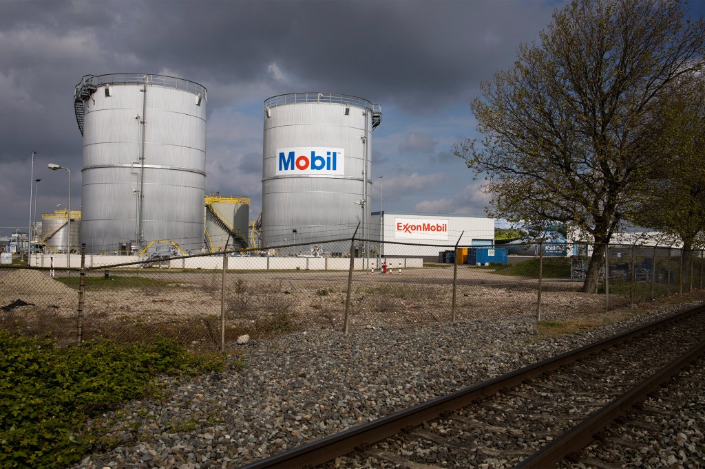 View of Exxon Mobil storage tanks of the petrochemical industry in the port of Rotterdam, Netherland