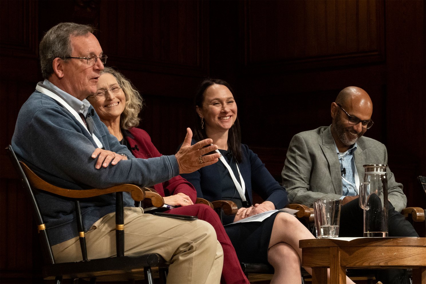 Panelists on stage at Sanders Theatre