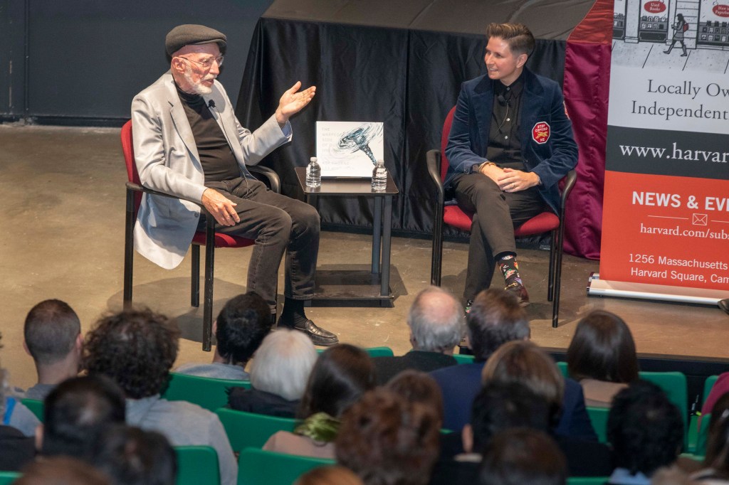 Kip Thorne and Lia Halloran seated on stage.