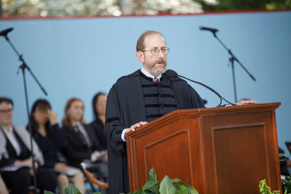 Alan Garber at the podium.