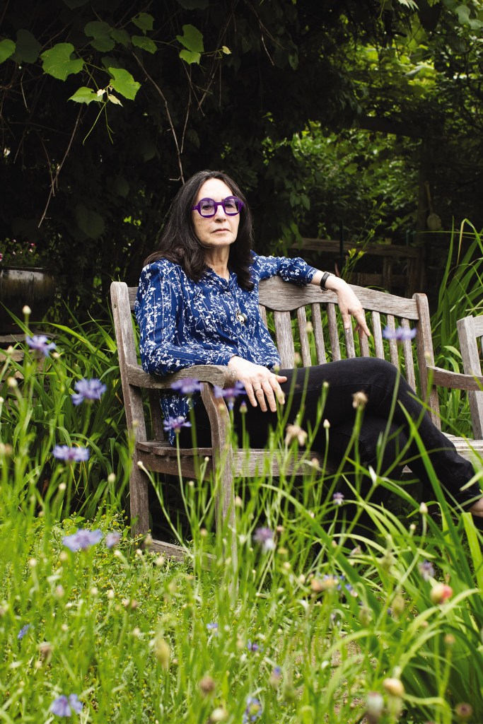 Francine Prose sitting on a bench.