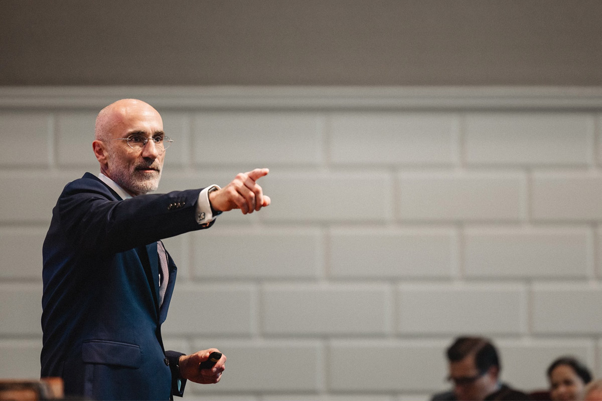 Arthur Brooks speaking at symposium.