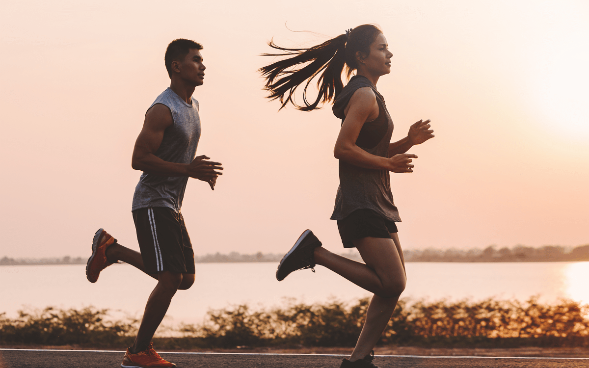 two people running