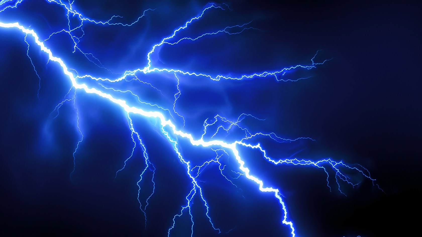 Blue lightning on dark background.