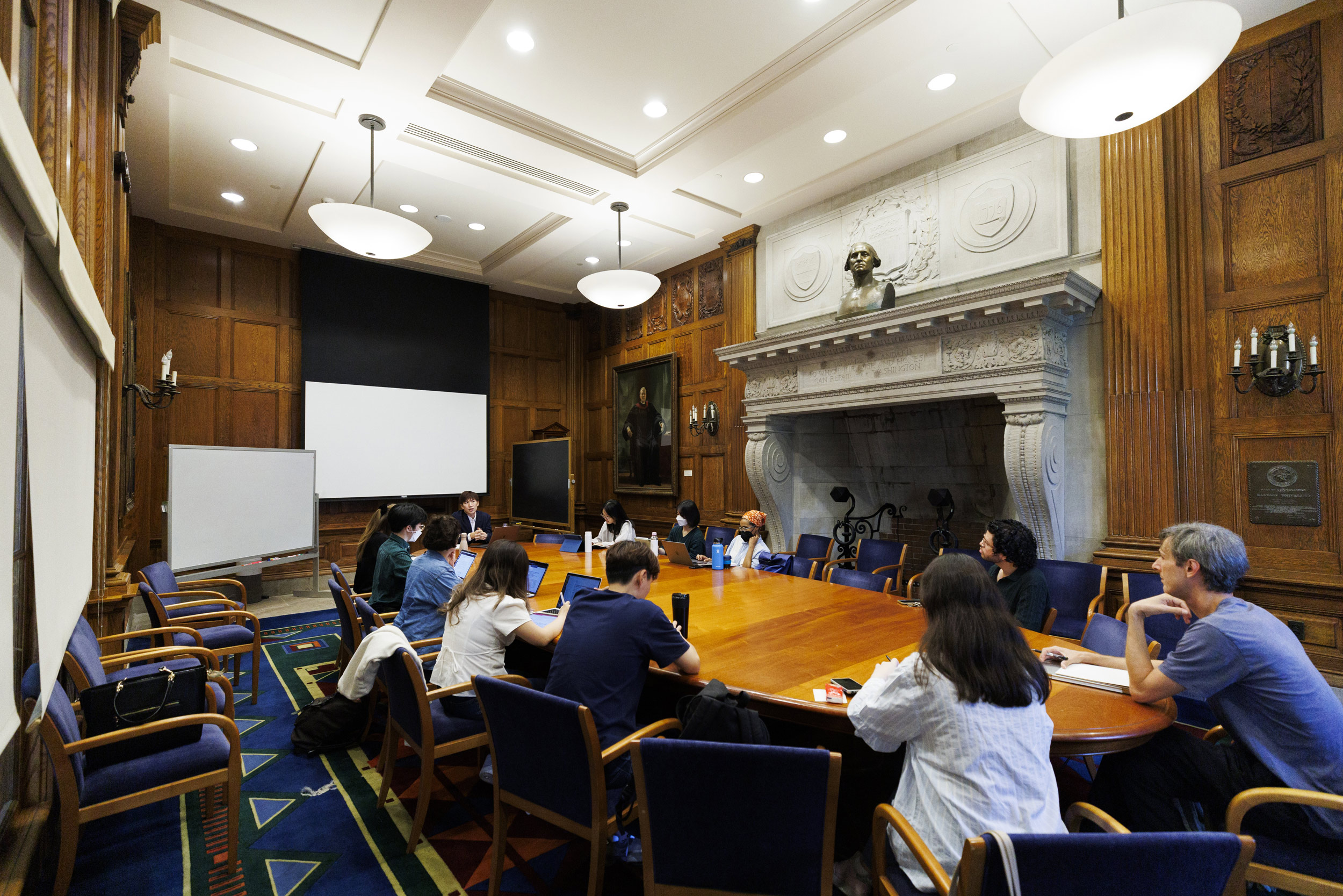 Lee-Lenfield gathers with students in a Barker Center classroom.