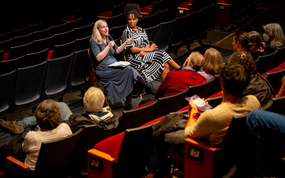 Meredith Goldstein (left) and producer Christine Ahanotu speaking inside the Loeb Drama Center.