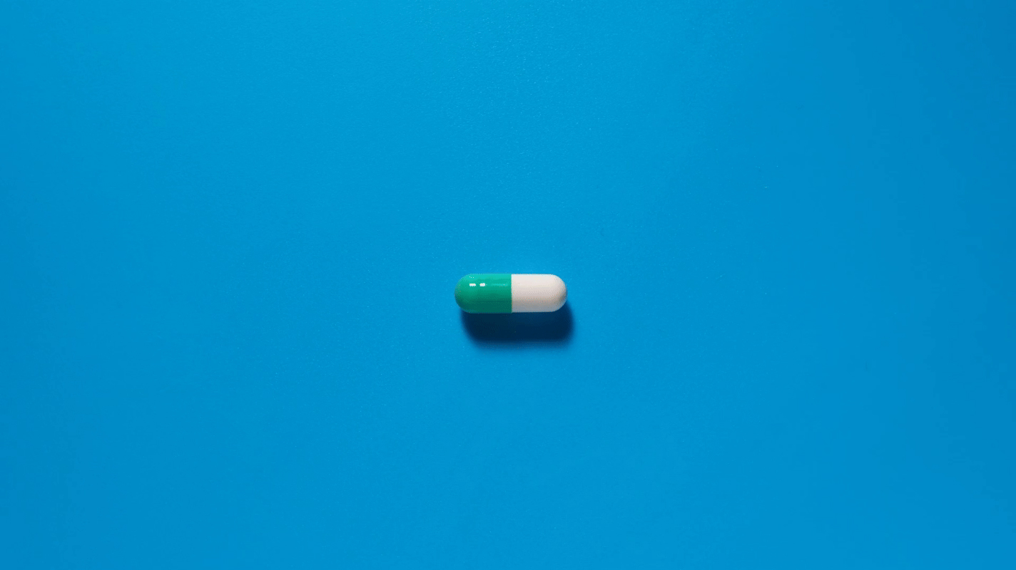 picture of a white and teal pill