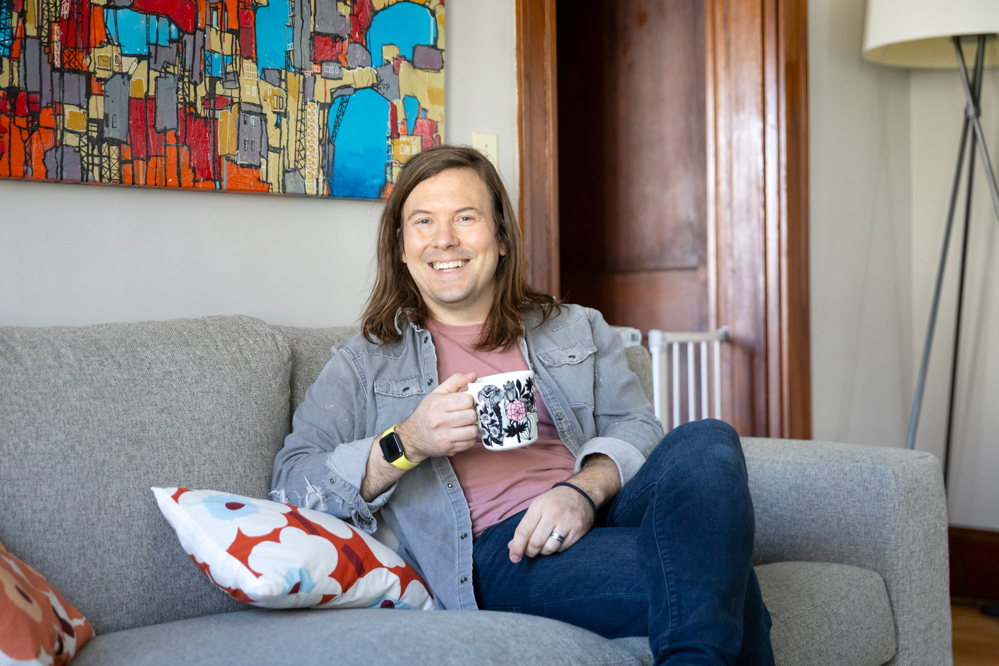 Scott Murry, Digital Illustrator and Senior Designer at the Harvard Library, is photographed in his apartment in Jamaica Plain.