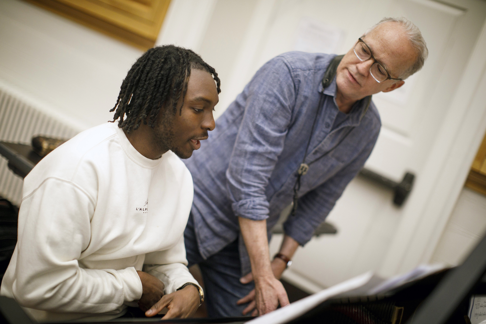 Timi Esan ’27 (left) and Ted Nash are pictured during rehearsal.