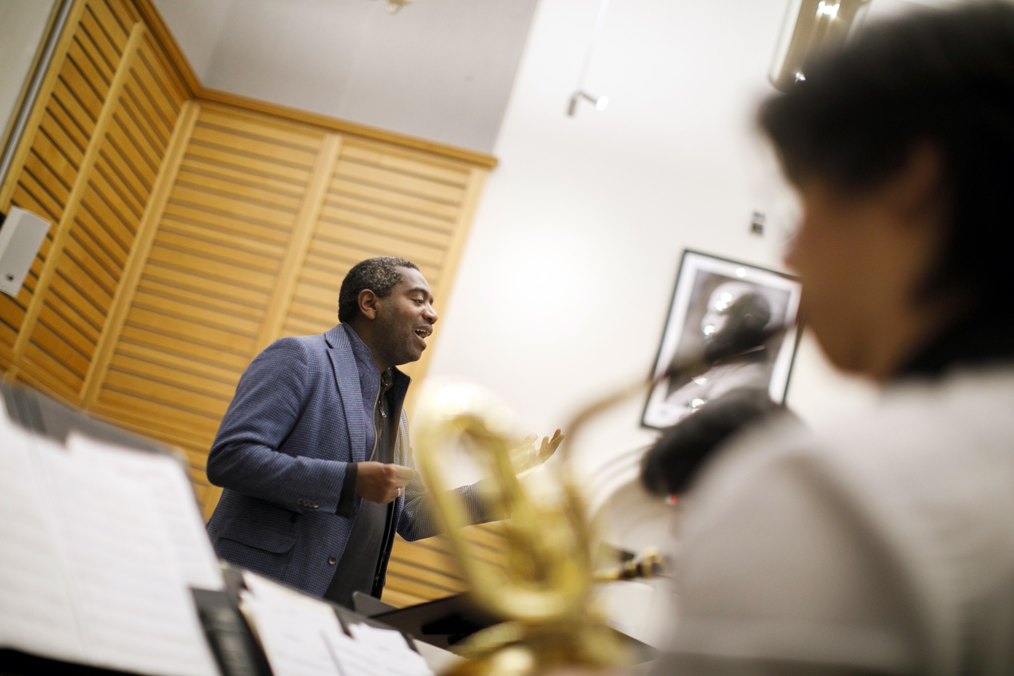 Director Yosvany Terry (left) conducts during rehearsal.
