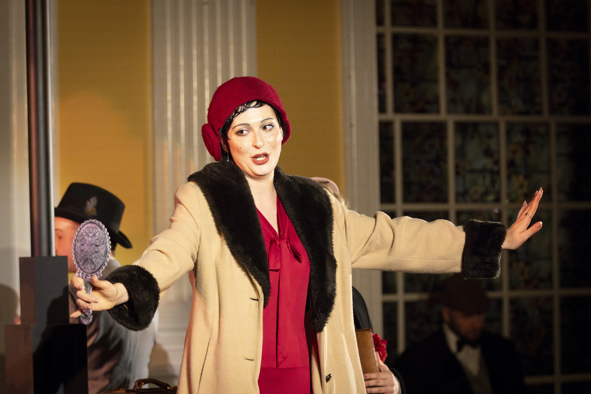 Chen Wine performs as “A lady with a hand mirror.”