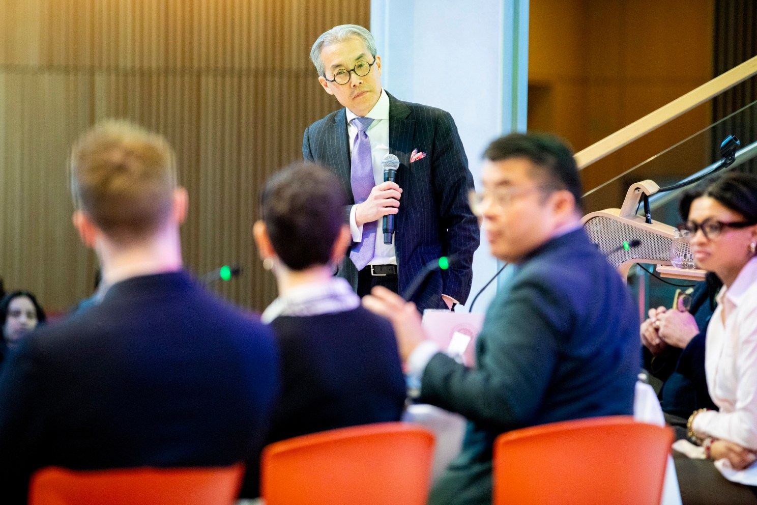 Nien-hê Hsieh (standing) posed a hypothetical to the panel.