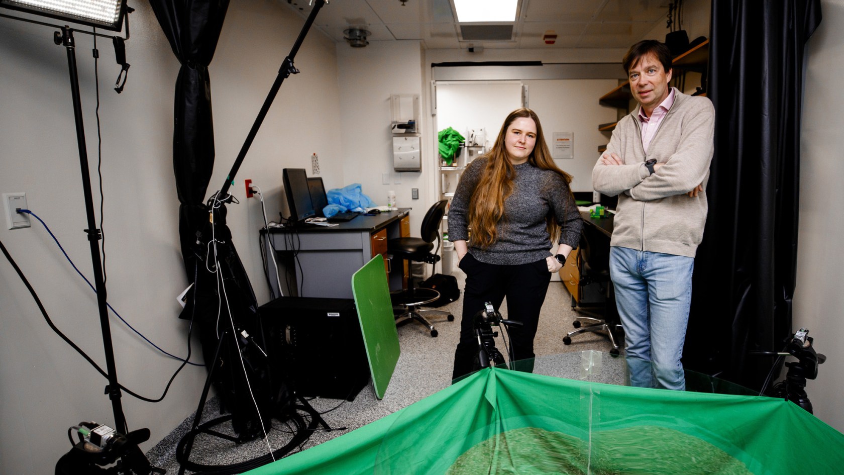 Postdoctoral Fellow Ugne Klibaite (left) and Bence P Ölveczky, Professor of Organismic and Evolutionary Biology, stand together in the lab where data is collected on rat behavior. They are part of a team publishing a new paper that introduces a new method for tracking, in unprecedented detail, the social lives and behaviors of rats towards a better understanding of Autism. Photo by Grace DuVal