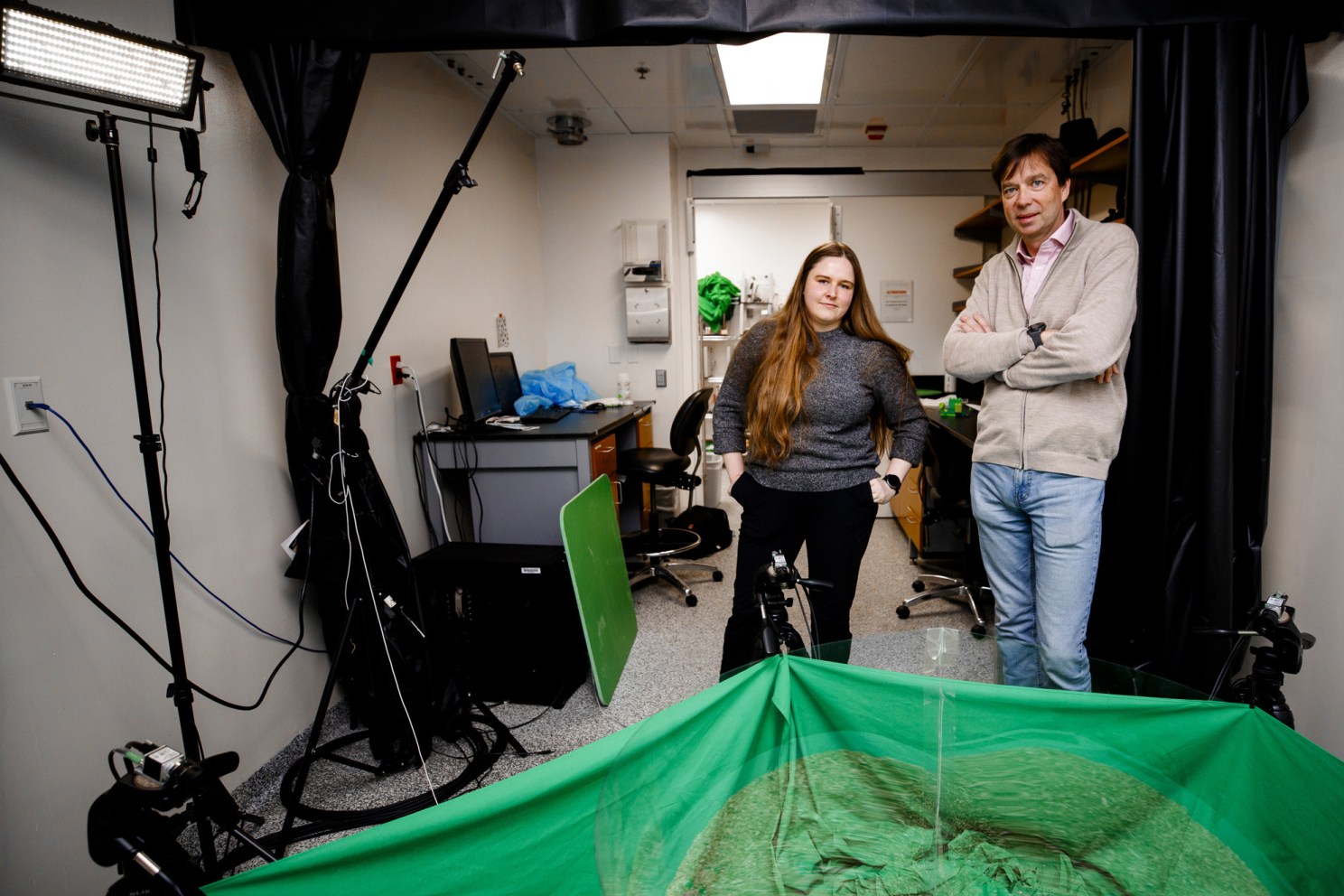 Postdoctoral Fellow Ugne Klibaite (left) and Bence P Ölveczky, Professor of Organismic and Evolutionary Biology, stand together in the lab where data is collected on rat behavior. They are part of a team publishing a new paper that introduces a new method for tracking, in unprecedented detail, the social lives and behaviors of rats towards a better understanding of Autism. Photo by Grace DuVal