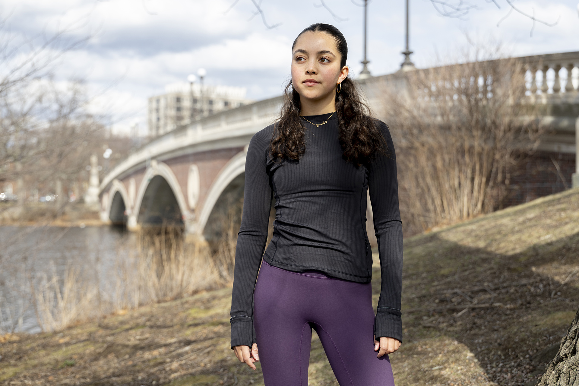 Brooke Stanford training for the marathon by the Charles River.