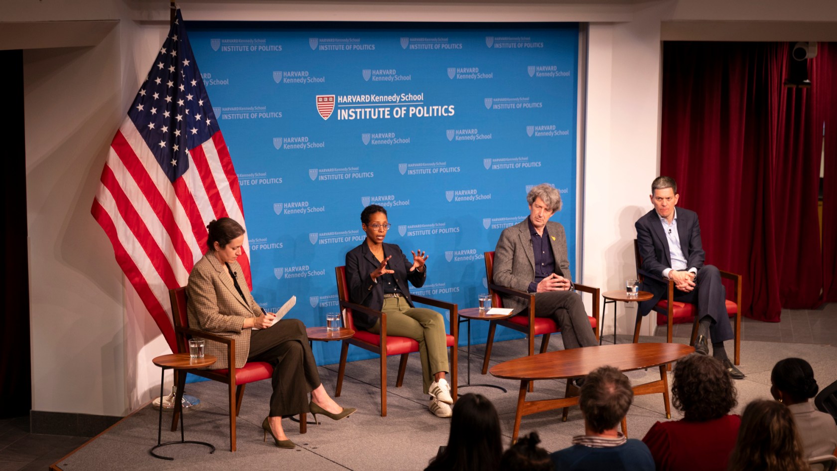 Zoe Marks (from left), Mai Hassan, Alex de Waal, and David Miliband on stage during the event.