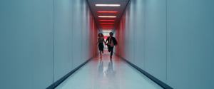 two character running down a hallway