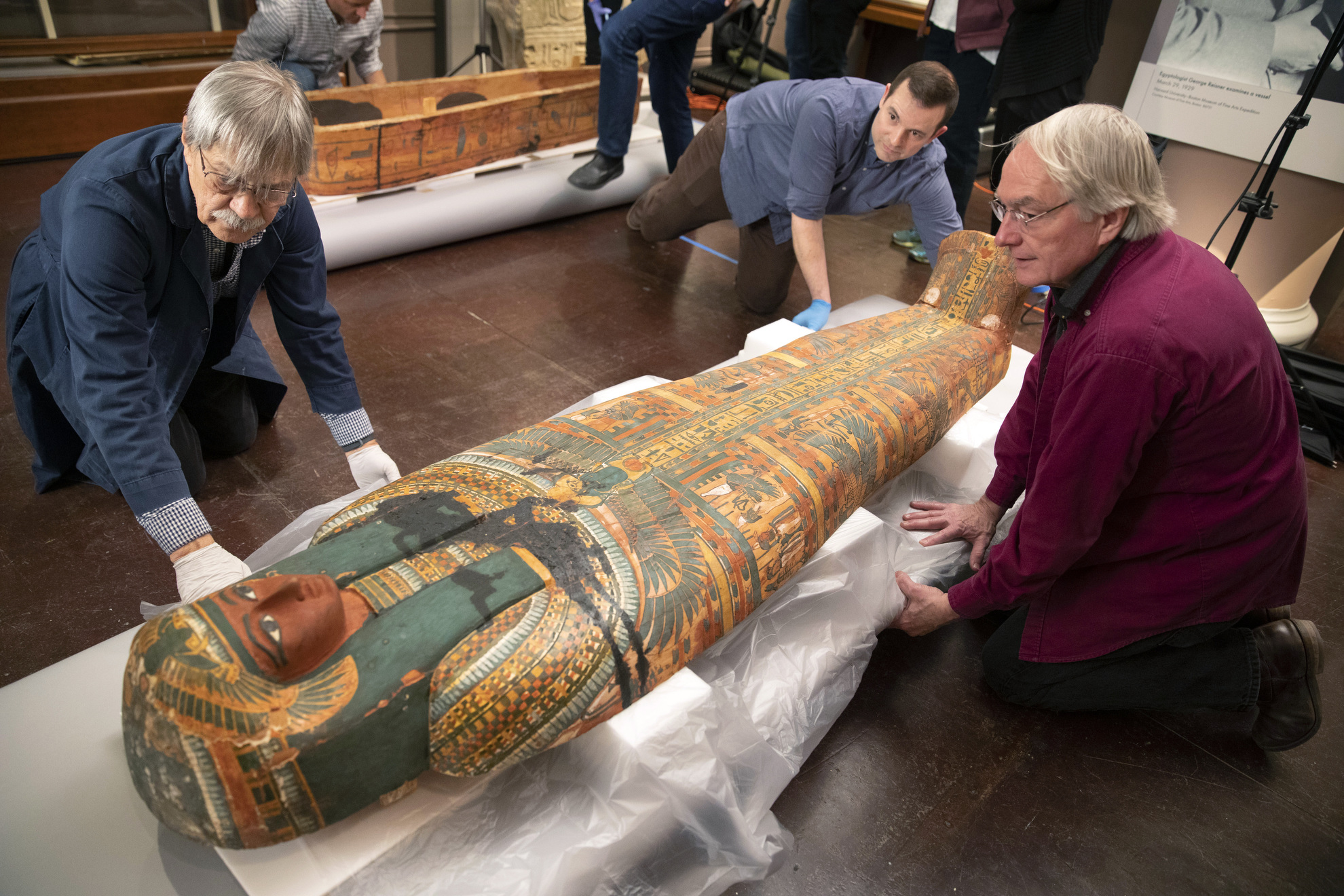 Dennis Piechota, (from left) Adam Middleton, and Joe Green work on the Coffin of Ankh-Khonsu with a team at the Semitic Museum opens ancient Egyptian coffins to analyze and photograph the coffins from all angles using scanning technology and 3D photography.