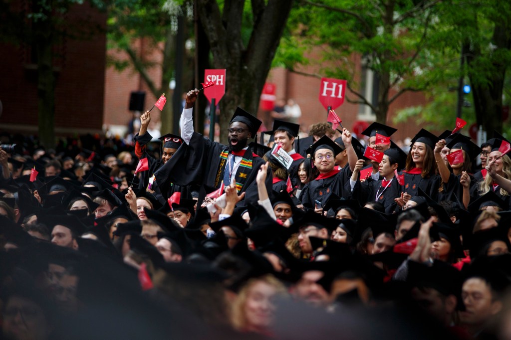 Graduates celebrate.