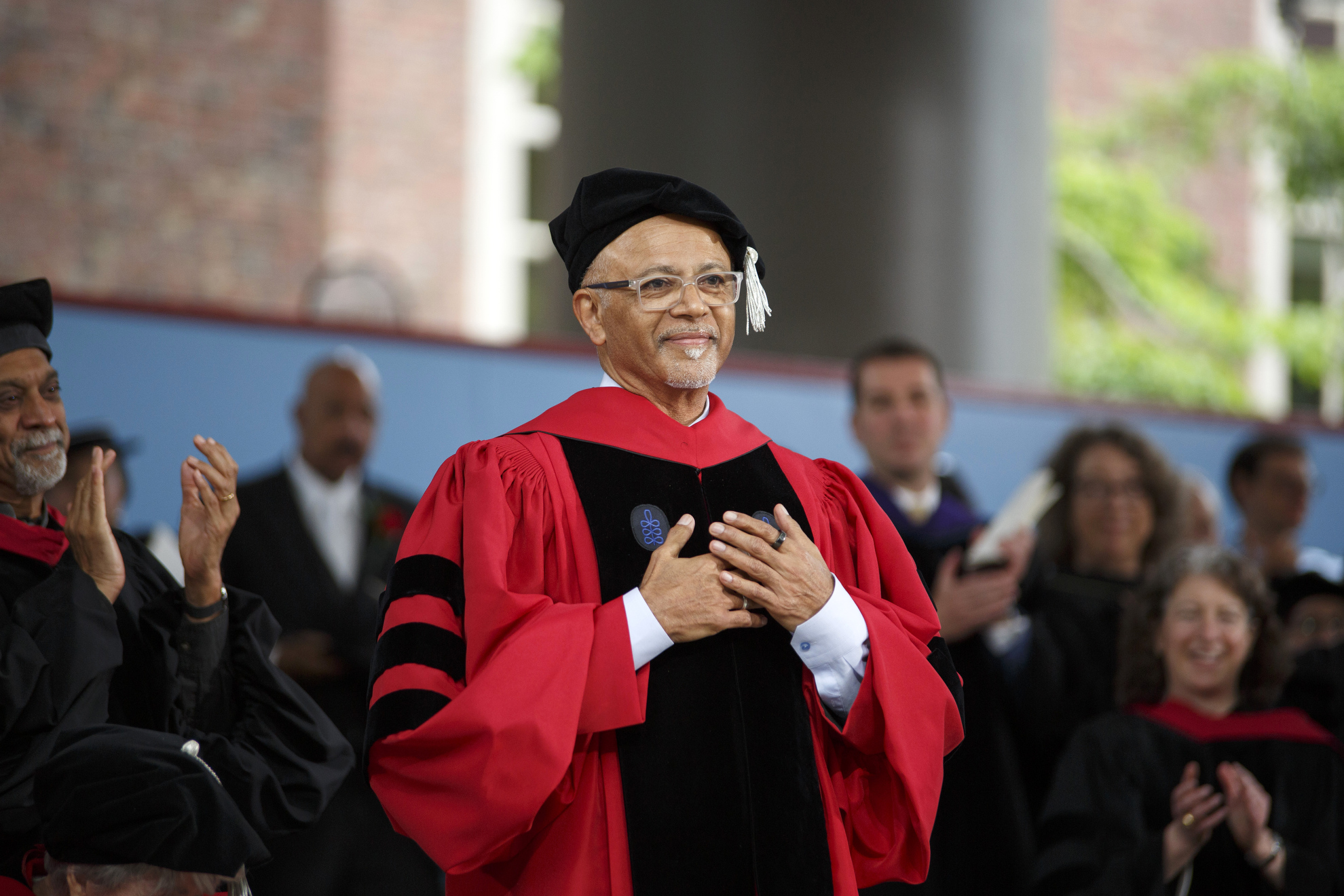 Commencement Speaker Abraham Verghese is pictured on stage.