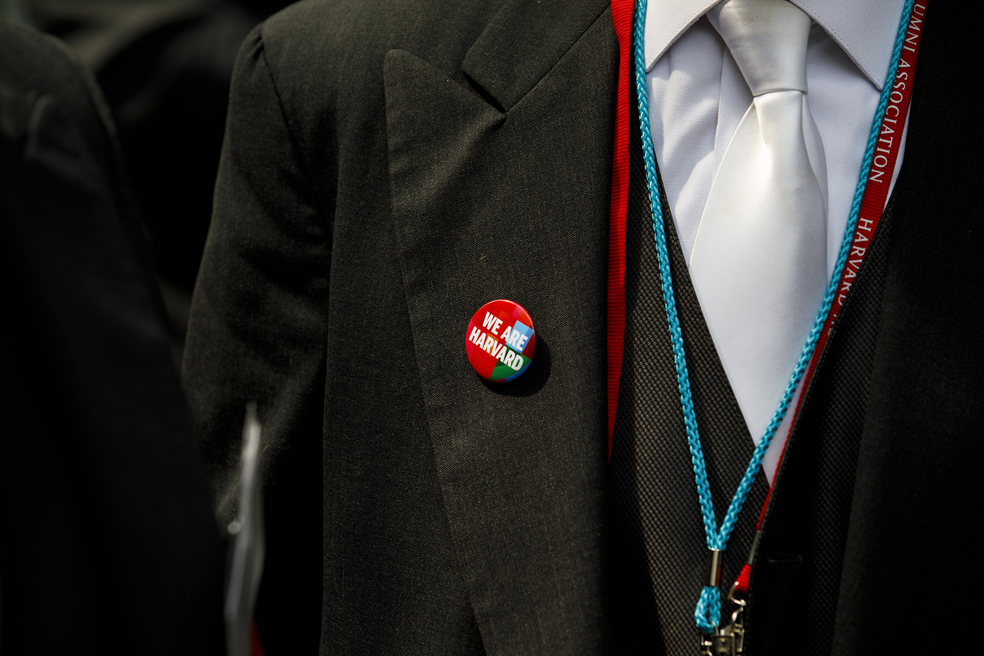 An alumnus wearing a “We Are Harvard.”
