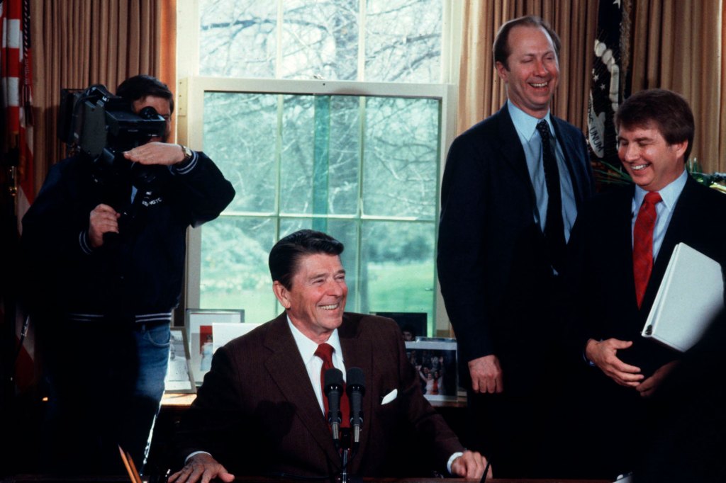 David Gergen in the Oval Office with President Reagan.