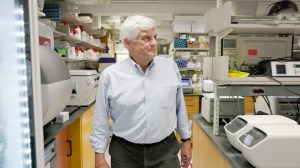 Researcher David Corey walks through his lab.