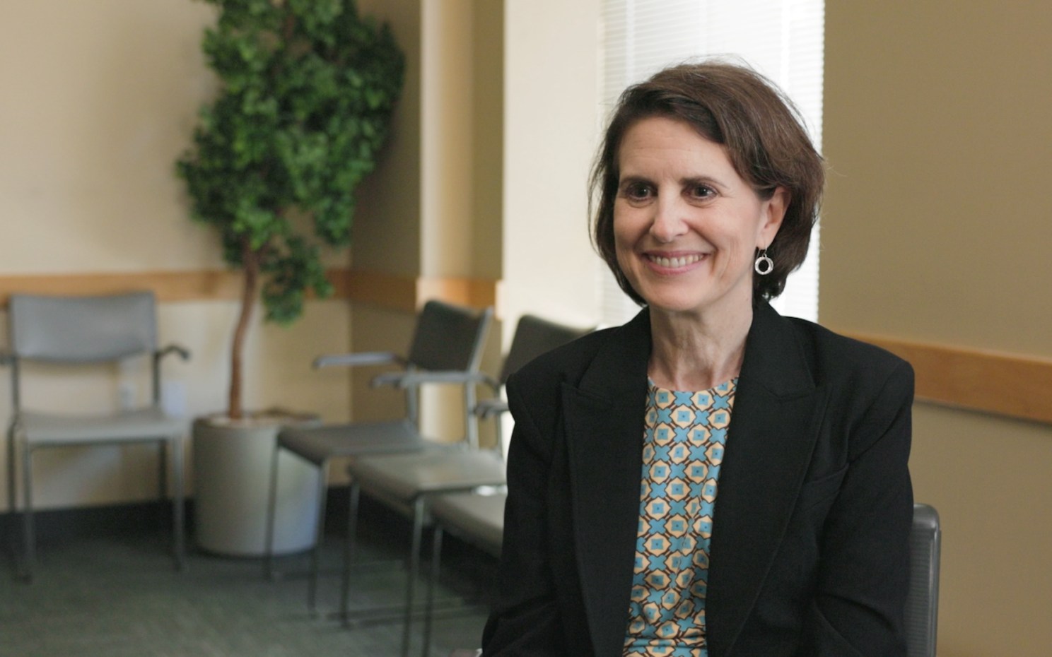 Nancy Keating sitting down to be interviewed.