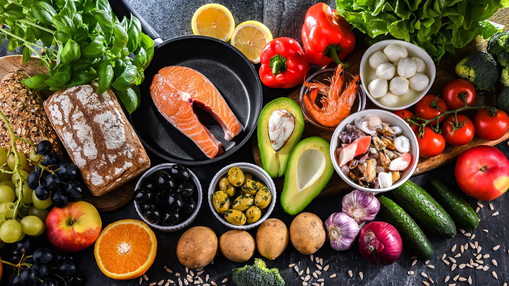 Fish, vegetables, and other foods found in Mediterranean diet.