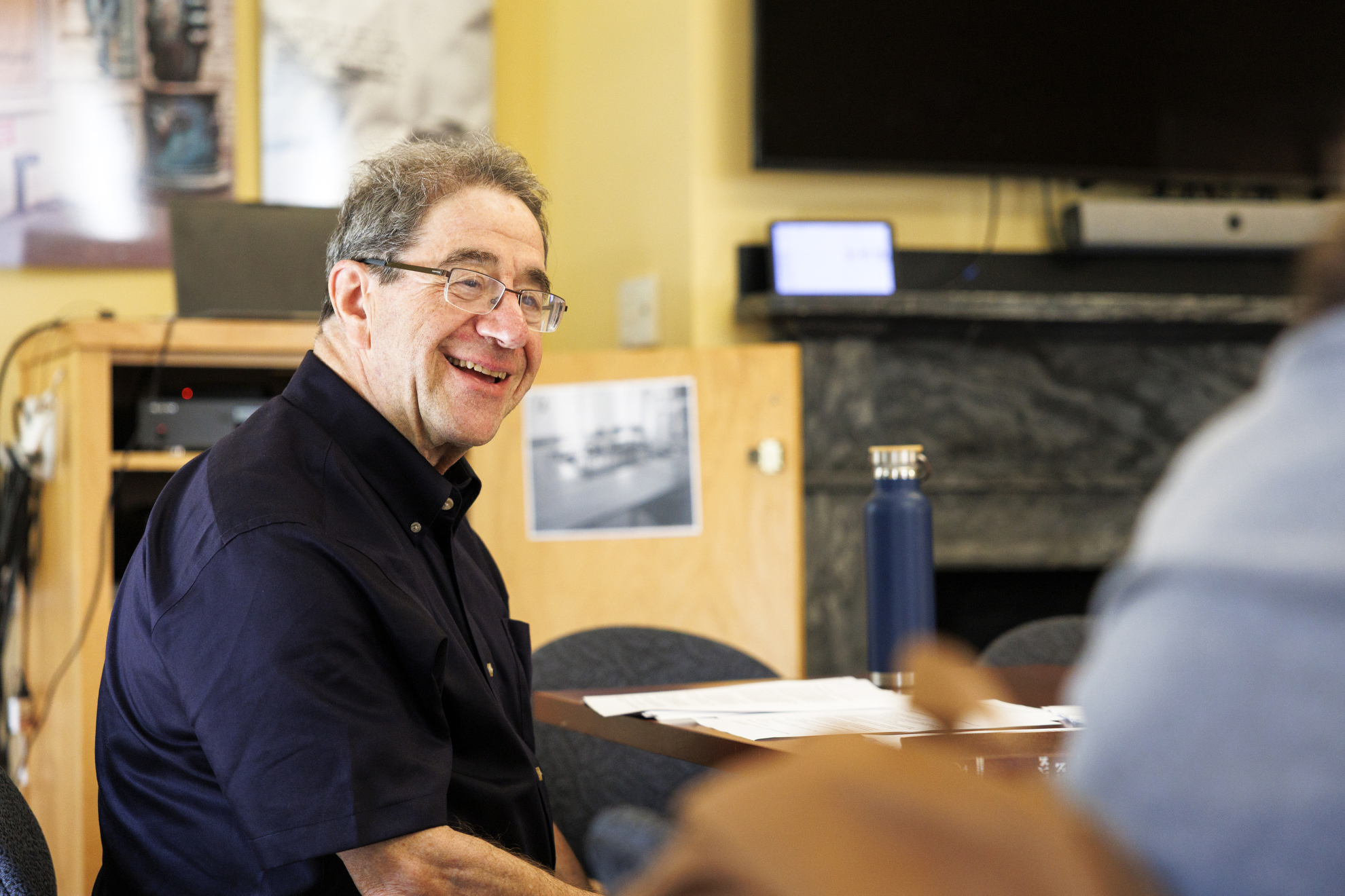 David Stern speaking to students during class.