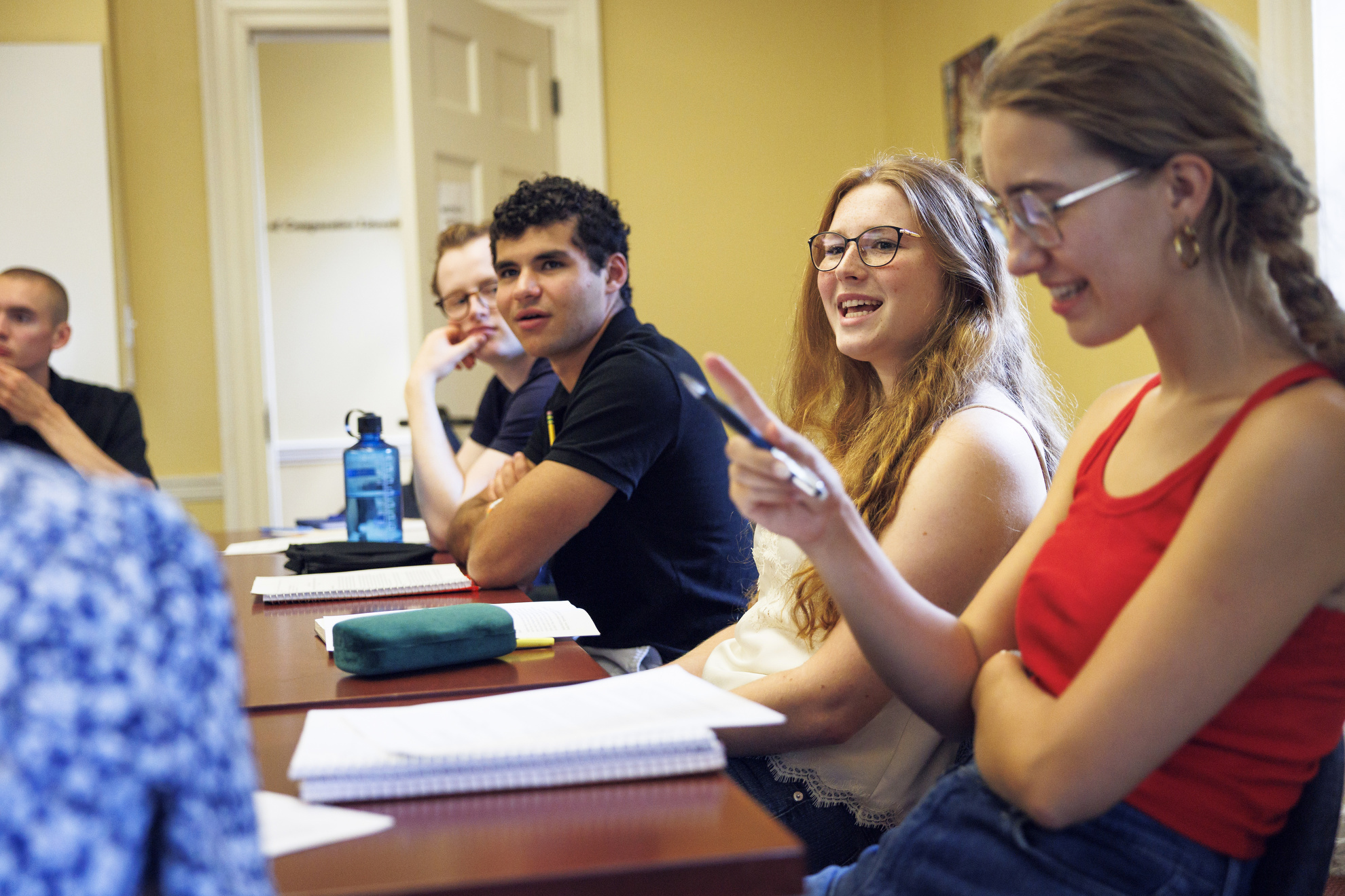 Max Friedman ’29 (from left), Amelia Sipkin ’29, and Elle Pomeroy du Pont ’29 interacting during class.