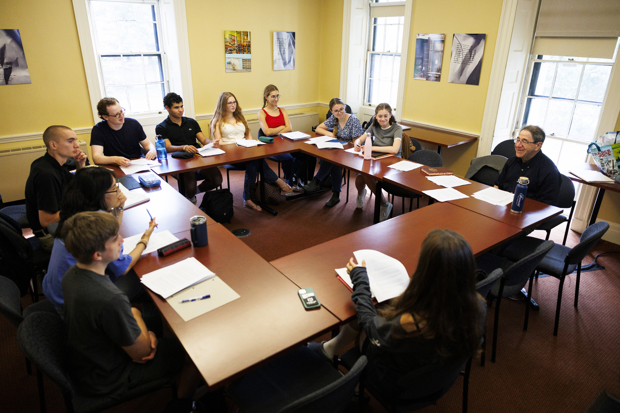A view of students and David Stern talking during class.