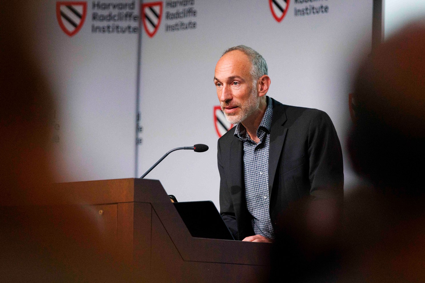 David Reich at lectern.