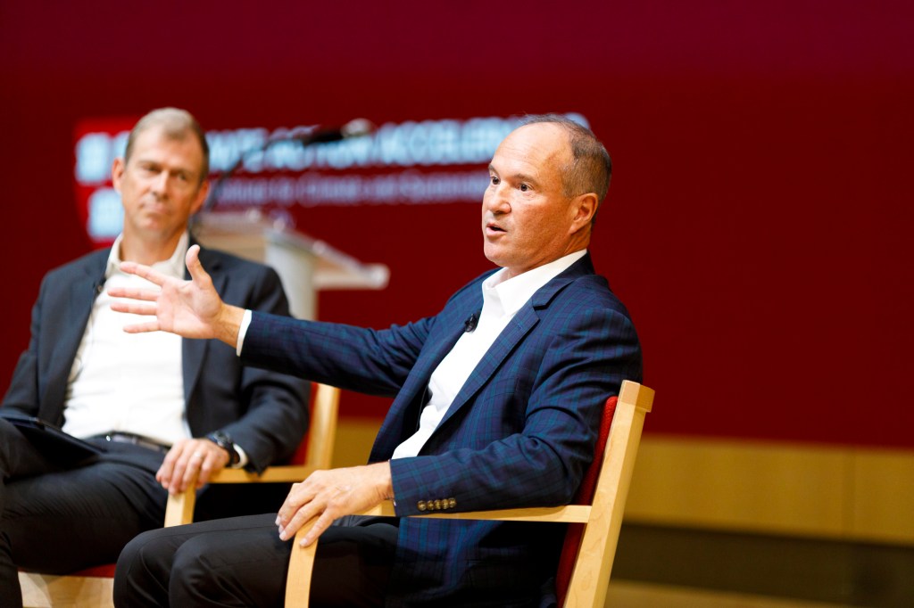 Joseph Dominguez speaking with Nat Keohane, the president of the Center for Climate and Energy Solutions.