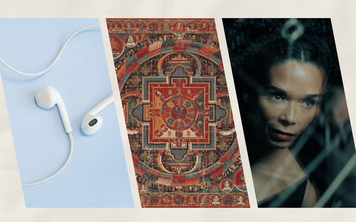 wired headphones, a carpet, a woman looking out the window