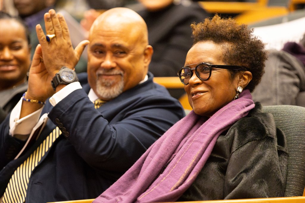 Marcyliena H. Morgan (right) smiles while their husband, Lawrence D. Bobo, applauds at her tribute in 2023.
