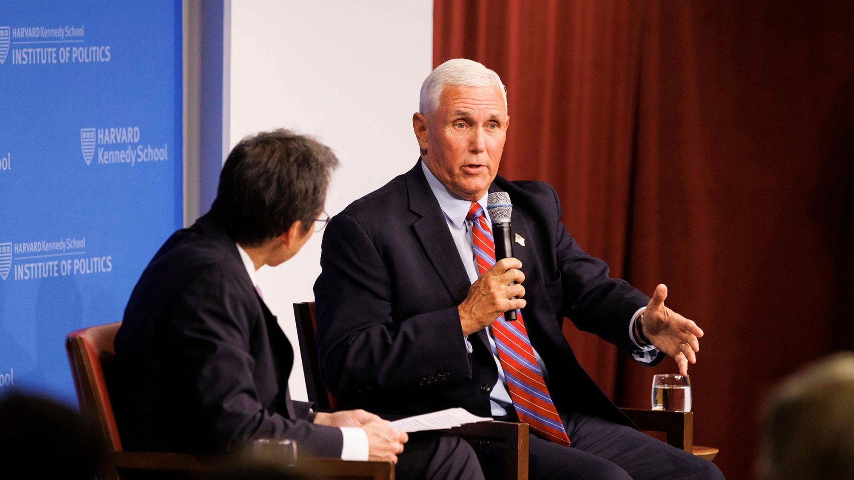 Mike Pence (right) and Archon Fung at the JFK Forum.