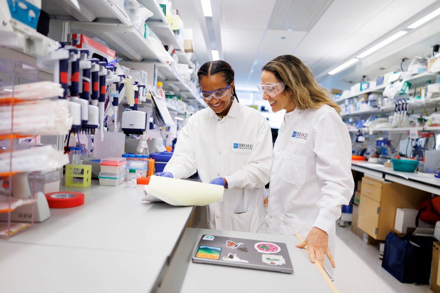 Tsion Abay (left) and Pardis Sabeti in the lab.
