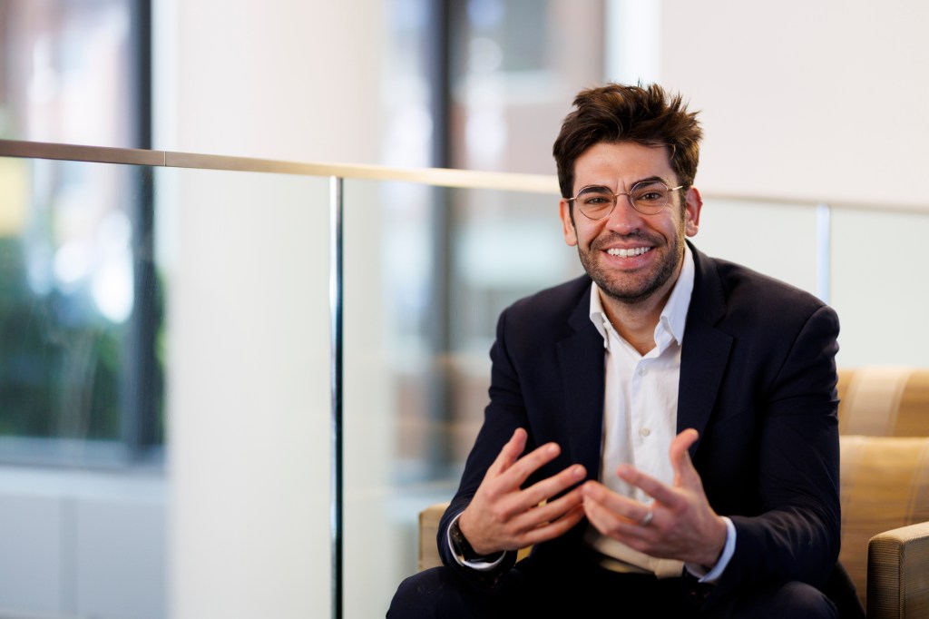 Ely Sandler sitting in a chair.