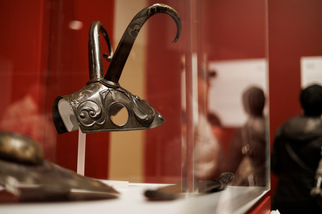 Photo of a third-century BCE ornamental bronze “Pony cap” 