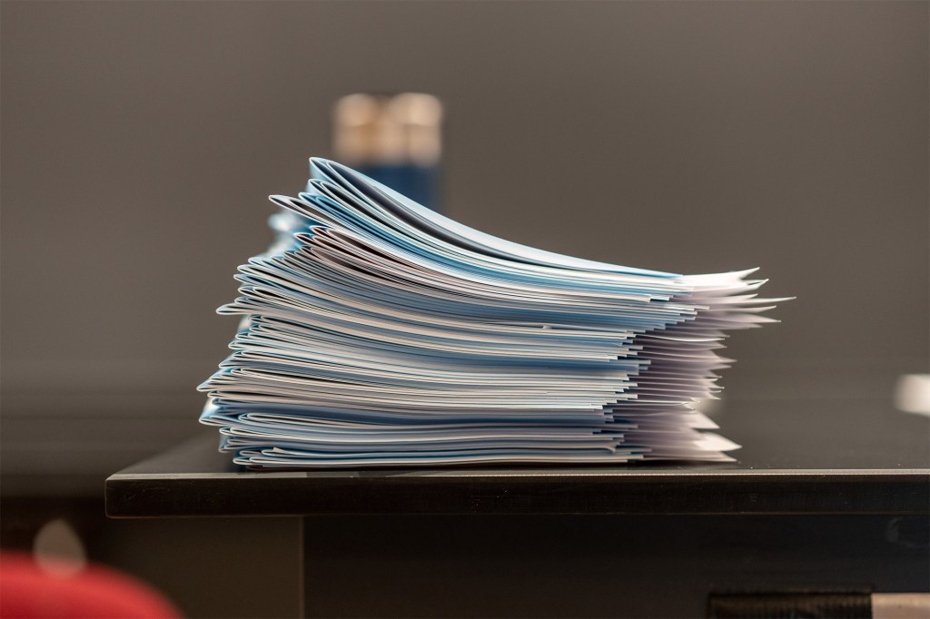 Stack of blue books.