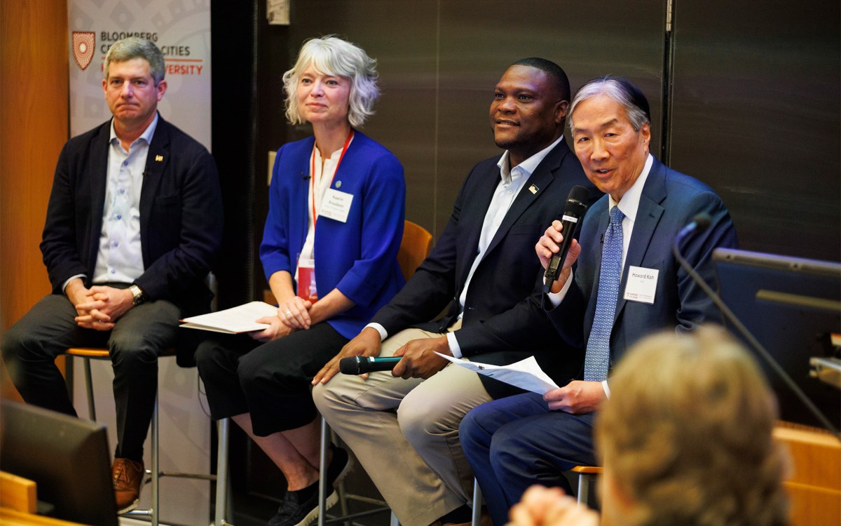 Patrick Farrell (left), Mayor of Huntington, West Virginia, Kaarin Knudson, Mayor of Eugene, Oregon, and Monroe Nichols, Mayor of Tulsa, Oklahoma, speak with moderator byHoward Koh,