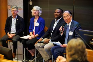 Patrick Farrell (left), Mayor of Huntington, West Virginia, Kaarin Knudson, Mayor of Eugene, Oregon, and Monroe Nichols, Mayor of Tulsa, Oklahoma, speak with moderator byHoward Koh,